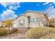 Single-story home with neutral exterior, and landscaped yard at 9364 W Cashman Dr, Peoria, AZ 85383