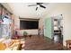 Playroom featuring hardwood floors, and a chalkboard, with a glimpse into a nearby dining area at 9713 E Onza Ave, Mesa, AZ 85212