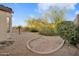 Landscaped backyard with a gravel area at 9830 E Acacia Dr, Scottsdale, AZ 85260