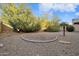 Landscaped backyard with a gravel area at 9830 E Acacia Dr, Scottsdale, AZ 85260