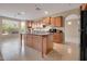 Kitchen with island, granite countertops and breakfast nook at 9830 E Acacia Dr, Scottsdale, AZ 85260