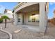 Covered patio extending from the house at 9830 E Acacia Dr, Scottsdale, AZ 85260