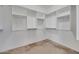 Spacious walk-in closet with ample shelving and hanging space at 9830 E Acacia Dr, Scottsdale, AZ 85260