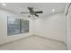 Bright bedroom with tile flooring and ceiling fan at 9990 N Scottsdale Rd # 1048, Paradise Valley, AZ 85253