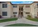 Condo building exterior with stairs and landscaping at 9990 N Scottsdale Rd # 1048, Paradise Valley, AZ 85253