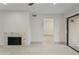 Bright living room with fireplace and tile flooring at 9990 N Scottsdale Rd # 1048, Paradise Valley, AZ 85253