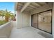 Private patio with sliding glass door access to the living area at 9990 N Scottsdale Rd # 1048, Paradise Valley, AZ 85253