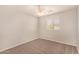 Bedroom with ceiling fan and window with blinds at 106 N 66Th Ave, Phoenix, AZ 85043