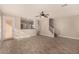 Open living room with kitchen view, wood-look floors at 106 N 66Th Ave, Phoenix, AZ 85043