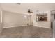 Open living room with kitchen view, wood-look floors at 106 N 66Th Ave, Phoenix, AZ 85043