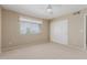 Bright bedroom with double door closet and window coverings at 1116 W Courtney Ln, Tempe, AZ 85284