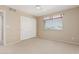 Well-lit bedroom with double door closet and window coverings at 1116 W Courtney Ln, Tempe, AZ 85284