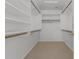 Large walk-in closet with double hanging rods and shelving at 1116 W Courtney Ln, Tempe, AZ 85284