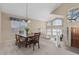 Formal dining room with a chandelier and view of the living room at 1116 W Courtney Ln, Tempe, AZ 85284