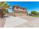 Two-story house with a three-car garage and gated driveway at 1116 W Courtney Ln, Tempe, AZ 85284