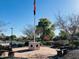 Community Veterans Plaza with benches and flagpole at 12692 N 152Nd Ave, Surprise, AZ 85379