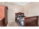 Bedroom with a wood bed frame and matching dresser, providing ample storage at 134 N 87Th St, Mesa, AZ 85207