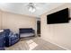 Cozy bedroom features a ceiling fan, neutral walls, and carpet for comfort at 134 N 87Th St, Mesa, AZ 85207