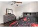 Bedroom features tile flooring, natural light, and gray bedroom set at 134 N 87Th St, Mesa, AZ 85207