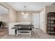 Cozy dining area featuring built-in seating, a stylish light fixture, and neutral decor at 134 N 87Th St, Mesa, AZ 85207