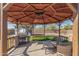 Gazebo with custom BBQ, bar, and outdoor furniture for entertaining at 134 N 87Th St, Mesa, AZ 85207