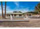 Single-story home with a carport and gated entrance at 13802 N 183Rd Ave, Surprise, AZ 85388