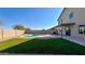 Backyard oasis with a sparkling pool at 15058 W Fillmore St, Goodyear, AZ 85338