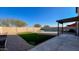 Backyard with pool and artificial turf at 15058 W Fillmore St, Goodyear, AZ 85338