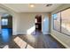Bright dining room with hardwood floors and archways at 15058 W Fillmore St, Goodyear, AZ 85338