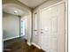 Elegant entryway with hardwood floors and interior doors at 15058 W Fillmore St, Goodyear, AZ 85338