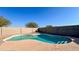Inviting kidney-shaped pool in backyard at 15058 W Fillmore St, Goodyear, AZ 85338