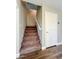 Carpeted staircase leading to the upper level at 15058 W Fillmore St, Goodyear, AZ 85338
