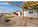 Backyard with pergola, firepit and artificial turf at 1561 W 5Th St, Mesa, AZ 85201