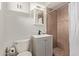 Updated bathroom with gray vanity, shower, and toilet at 1561 W 5Th St, Mesa, AZ 85201