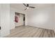 Spacious bedroom with ceiling fan and large closet at 1561 W 5Th St, Mesa, AZ 85201