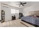 Bright bedroom with double bed, nightstand and ceiling fan at 1561 W 5Th St, Mesa, AZ 85201