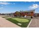 Ranch-style home with putting green and updated landscaping at 1561 W 5Th St, Mesa, AZ 85201