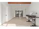 Light-filled hallway with hardwood floors and view into the living area at 1561 W 5Th St, Mesa, AZ 85201