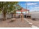 Outdoor patio area with pergola, grill, and firepit at 1561 W 5Th St, Mesa, AZ 85201
