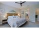 Main bedroom with en-suite bathroom and walk-in closet at 16918 W Palm Ln, Goodyear, AZ 85395