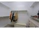 Bright walk-in closet with ample shelving and hanging space at 16918 W Palm Ln, Goodyear, AZ 85395