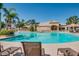 Inviting community pool with lounge chairs at 16918 W Palm Ln, Goodyear, AZ 85395