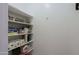 Well-organized pantry with ample shelving at 16918 W Palm Ln, Goodyear, AZ 85395