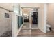 This is a bathroom featuring a shower and entry to a walk-in closet at 18001 N 53Rd St, Scottsdale, AZ 85254