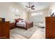 Comfortable bedroom with vaulted ceiling, natural light, and stylish decor for relaxing at 18001 N 53Rd St, Scottsdale, AZ 85254