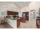 Spacious kitchen with stainless steel appliances, granite countertops, and a large island at 18001 N 53Rd St, Scottsdale, AZ 85254