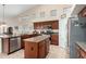 Bright kitchen with stainless appliances, granite countertops, and plenty of cabinet space at 18001 N 53Rd St, Scottsdale, AZ 85254