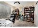 Organized office space with ample shelving for books and decor, promoting productivity at 18001 N 53Rd St, Scottsdale, AZ 85254