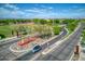 Aerial view of community featuring parks and roads at 19684 N 260Th Ave, Buckeye, AZ 85396