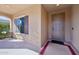 Front entry with decorative door and sidelight at 19684 N 260Th Ave, Buckeye, AZ 85396